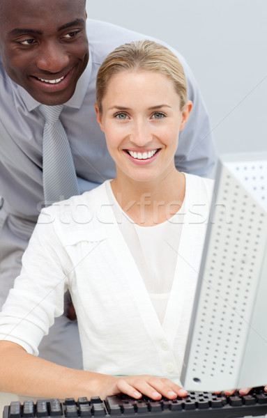 Afro-american businessman and his colleague working at a compute Stock photo © wavebreak_media