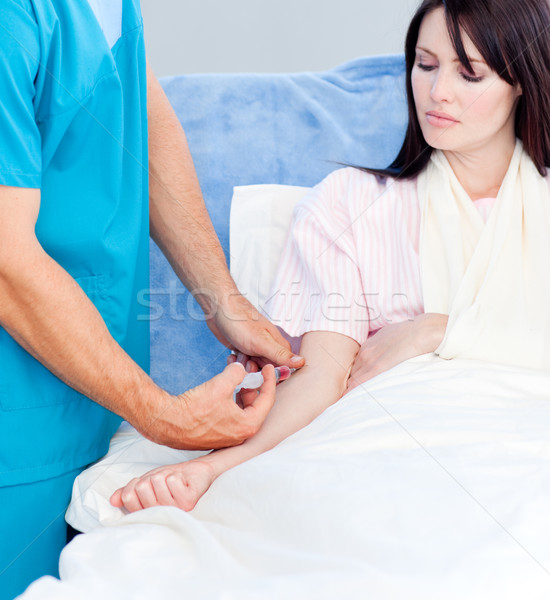 Close-up of a doctor giving an injection to a woman Stock photo © wavebreak_media
