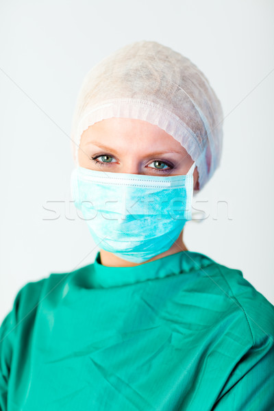 Agradable femenino cirujano máscara cara médico Foto stock © wavebreak_media