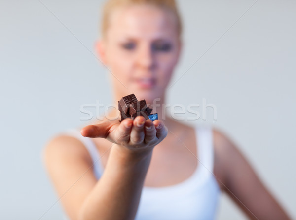 Beautiful woman holding chocolate focus on chocolate  Stock photo © wavebreak_media