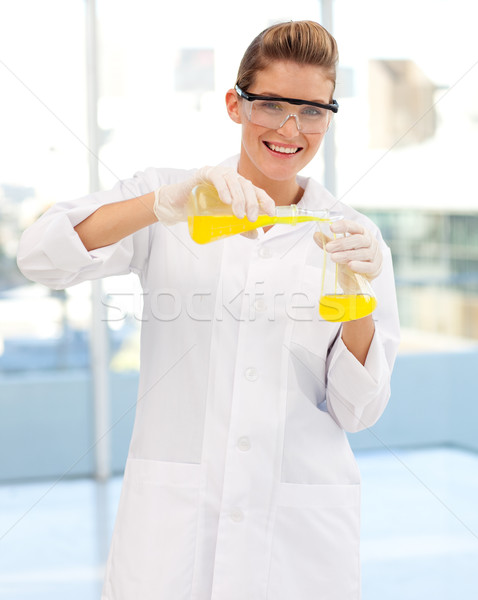 Young female scientist examining a test-tube Stock photo © wavebreak_media