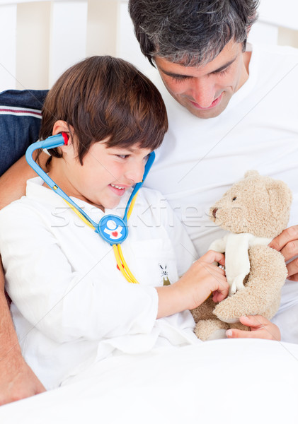 Stok fotoğraf: Baba · hasta · oğul · oynama · stetoskop