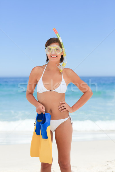 Femeie masca plajă bikini palmier sân Imagine de stoc © wavebreak_media