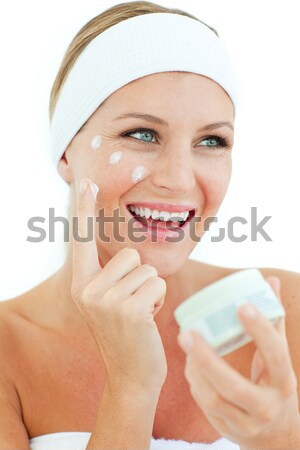 Bonne recherche jeune femme serviette brillant à lèvres blanche [[stock_photo]] © wavebreak_media