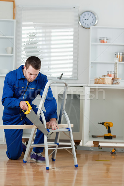 Portrait jeunes bricoleur cuisine [[stock_photo]] © wavebreak_media