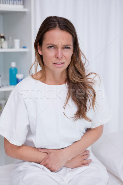 Woman having really bad stomachache Stock photo © wavebreak_media