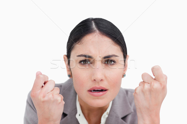 Close up of disappointed looking businesswoman against a white background Stock photo © wavebreak_media