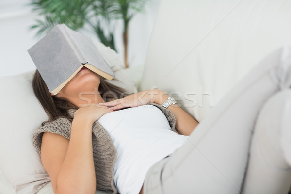 Stockfoto: Vrouw · sofa · slapen · boek · hoofd · woonkamer