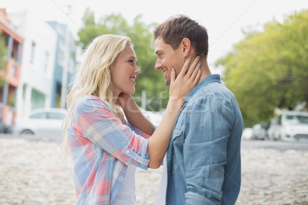 Hip young couple smiling at each other Stock photo © wavebreak_media