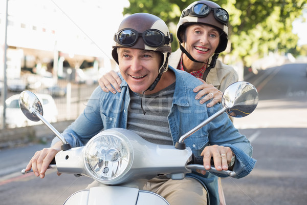 Heureux maturité couple équitation ville [[stock_photo]] © wavebreak_media