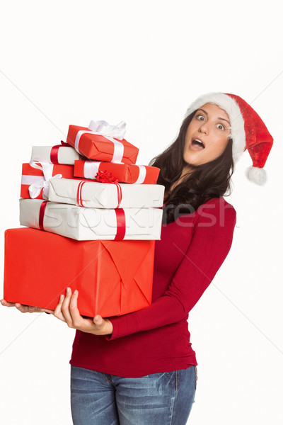 Woman holding many christmas presents Stock photo © wavebreak_media