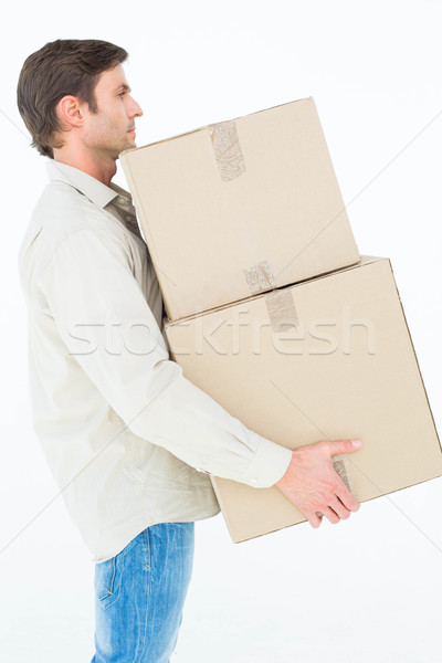 Delivery man carrying cardboard boxes Stock photo © wavebreak_media