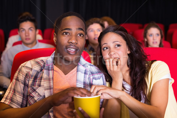 Young couple watching a film Stock photo © wavebreak_media