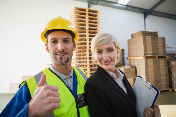 Stock photo: Portrait of smiling warehouse worker and his manager