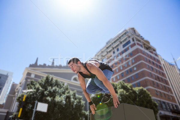 Athletic man doing parkour in the city Stock photo © wavebreak_media