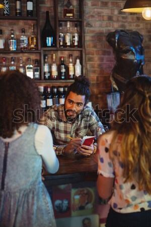 Two young men giving high five to each other Stock photo © wavebreak_media