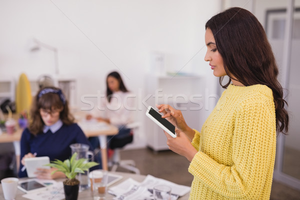 Side view of businesswoman using digital tablet Stock photo © wavebreak_media