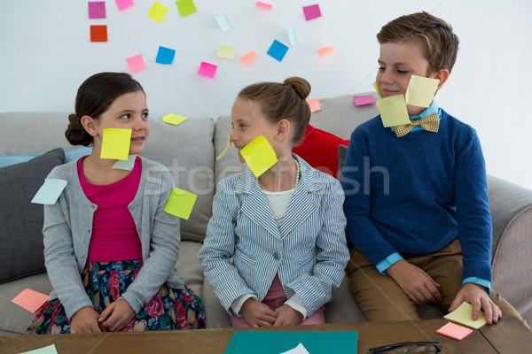Kids as business executives playing with sticky notes Stock photo © wavebreak_media