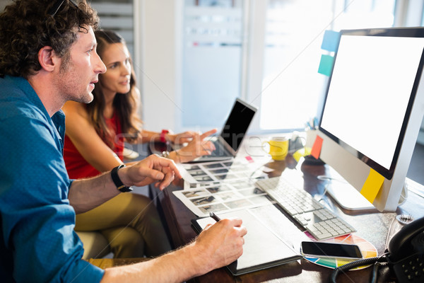 Colleagues using technology Stock photo © wavebreak_media