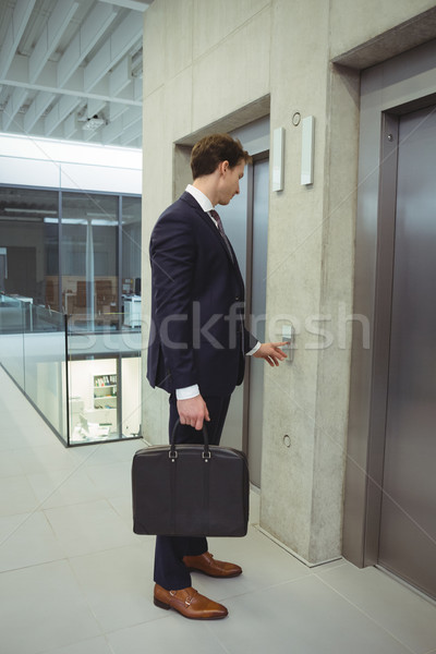 бизнесмен ждет лифта служба бизнеса человека Сток-фото © wavebreak_media