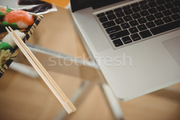 Close up of laptop by food on table Stock photo © wavebreak_media