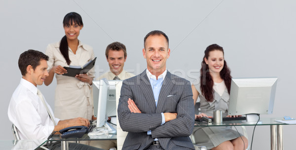 Stock photo: Business partners working with their manager