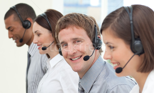 Oameni de afaceri setul cu cască call center calculator fericit microfon Imagine de stoc © wavebreak_media