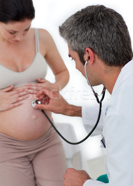Beautiful pregnant woman examined by her gynecologist Stock photo © wavebreak_media