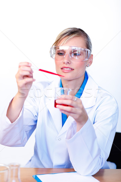 Female scientist examining a test-tube Stock photo © wavebreak_media