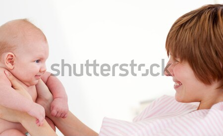Woman playing with her newborn baby Stock photo © wavebreak_media