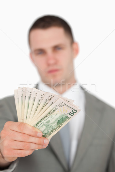 Portrait of a businessman showing notes against a white background Stock photo © wavebreak_media