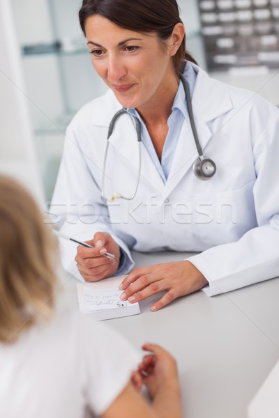 Doktor oturma ofis tıbbi kadın kâğıt Stok fotoğraf © wavebreak_media