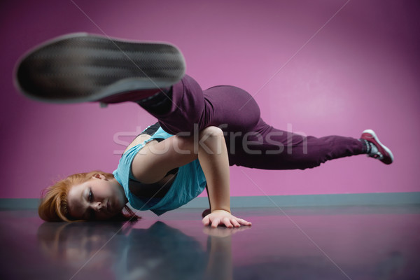 Pretty break dancer busting a move Stock photo © wavebreak_media
