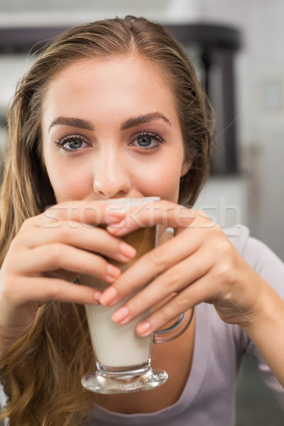 Pretty blonde enjoying a latte Stock photo © wavebreak_media