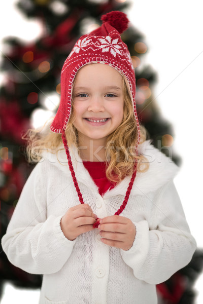 Festive little girl in hat and scarf Stock photo © wavebreak_media