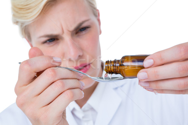 Orvos áramló gyógyszer kanál fehér nő Stock fotó © wavebreak_media