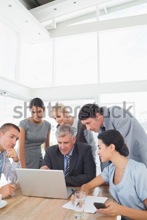 Stock photo: Businessman forecasting the future with his crystal ball