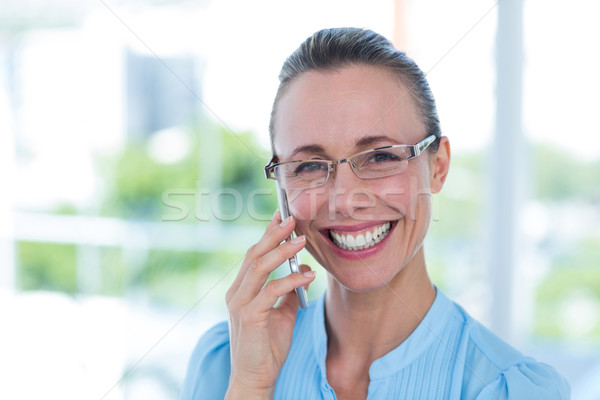 Sorridente empresária telefonema escritório mulher feliz Foto stock © wavebreak_media