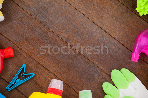 Cleaning equipments arranged on wooden floor Stock photo © wavebreak_media