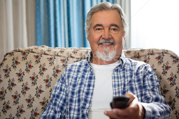 Porträt lächelnd Senior Mann Remote Sitzung Stock foto © wavebreak_media
