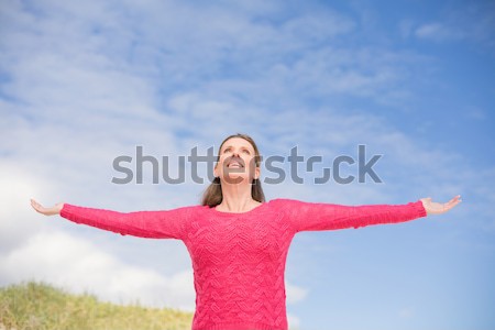 Woman performing stretching exercise on a sunny day Stock photo © wavebreak_media