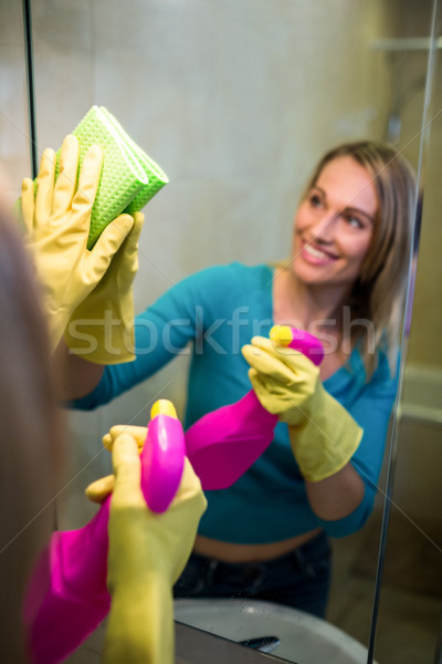 Pretty woman doing her house chores Stock photo © wavebreak_media