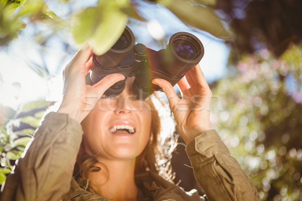 Woman using binoculars Stock photo © wavebreak_media
