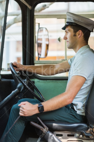 Foto stock: ônibus · motorista · condução · homem · engrenagem · boné