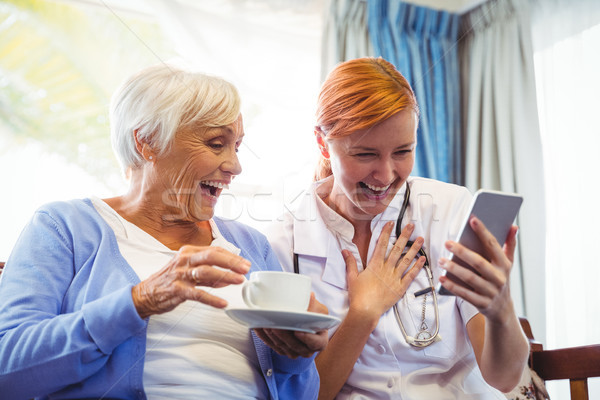 Senior woman and nurse using digital tablet Stock photo © wavebreak_media