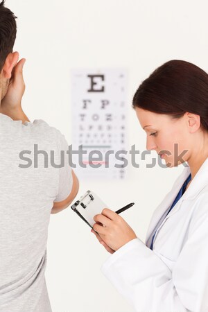 Médico examinar mujer digital tableta Foto stock © wavebreak_media
