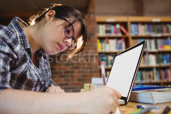 Kadın öğrenci yazı notlar kütüphane büro Stok fotoğraf © wavebreak_media