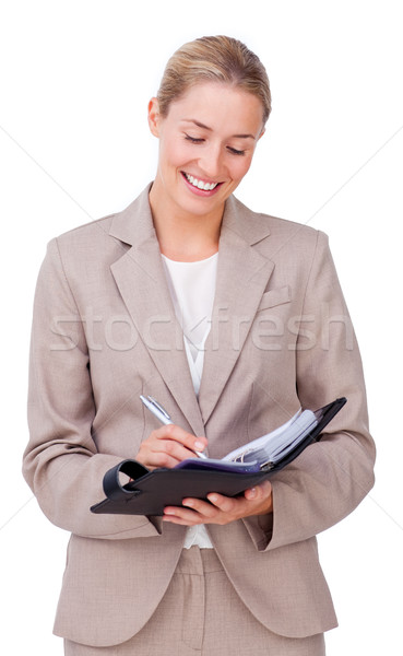 Jonge zakenvrouw merkt agenda geïsoleerd Stockfoto © wavebreak_media