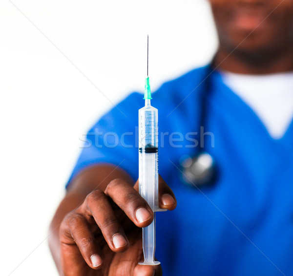 Doctor holding a syringe Stock photo © wavebreak_media