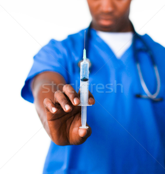 Doctor holding a syringe Stock photo © wavebreak_media